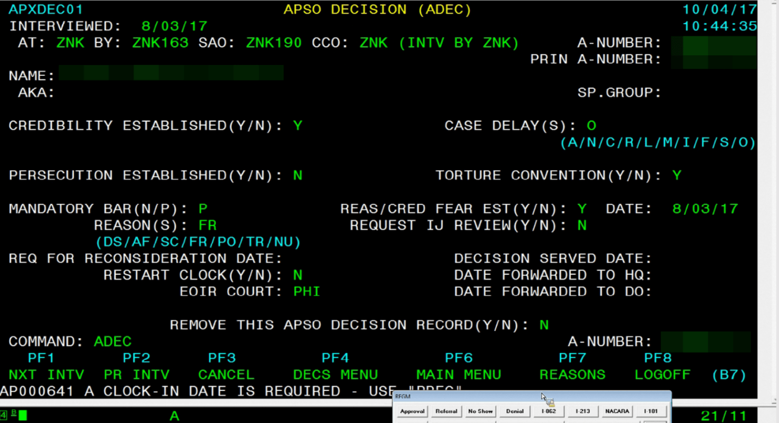 The mainframe immigration system we replaced, RAPS. A black screen with a mess of different colored text and inputs scattered about.